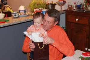 Helping papa open presents