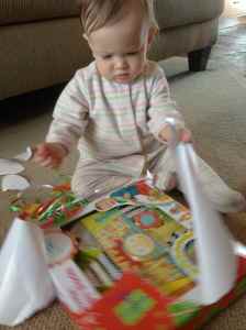 Examining a gift from Brett and Jen