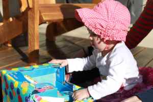Opening your first birthday present